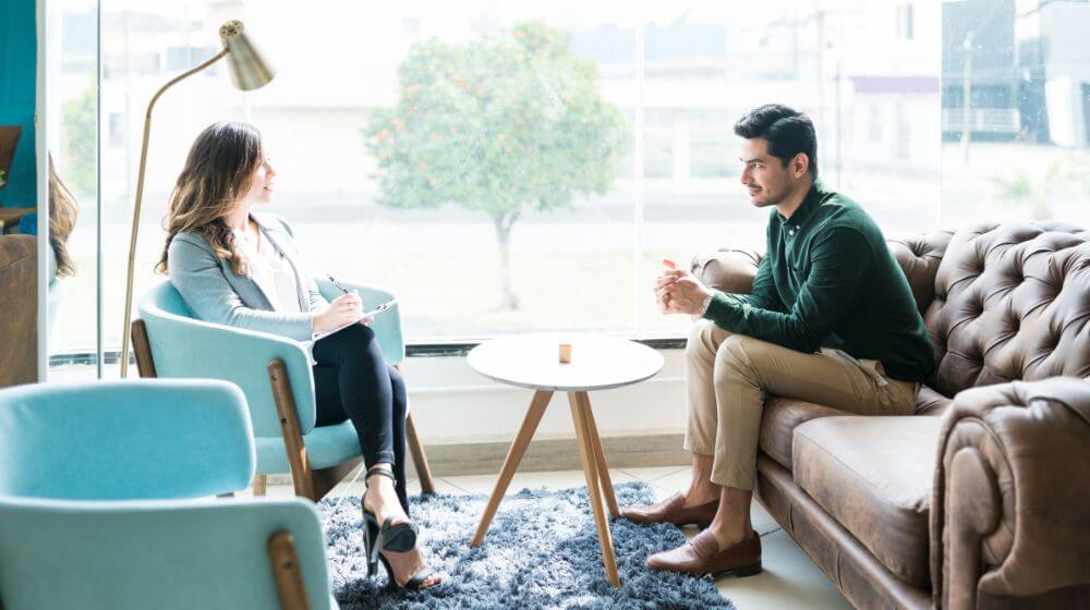 Counsellor working with a client.